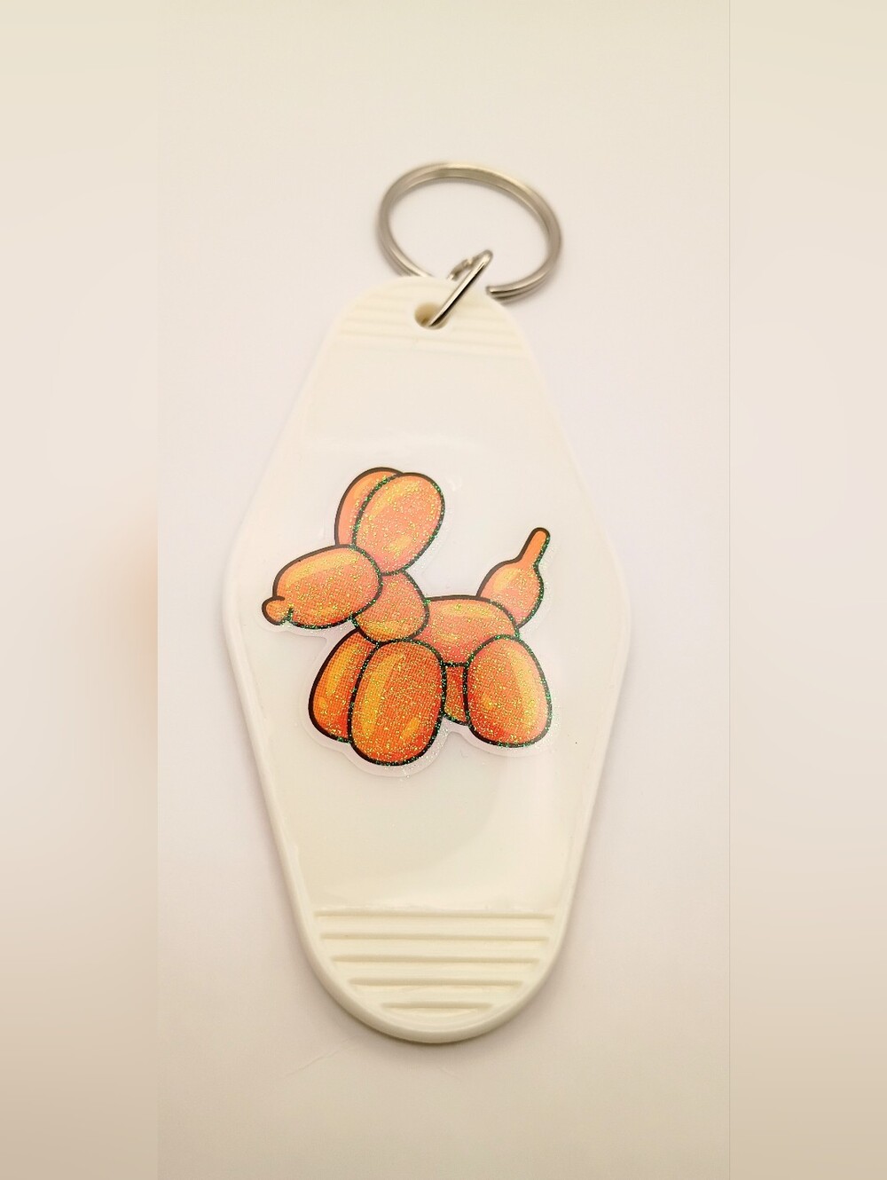 White Dog Keychain with Orange Balloon Dog Charm